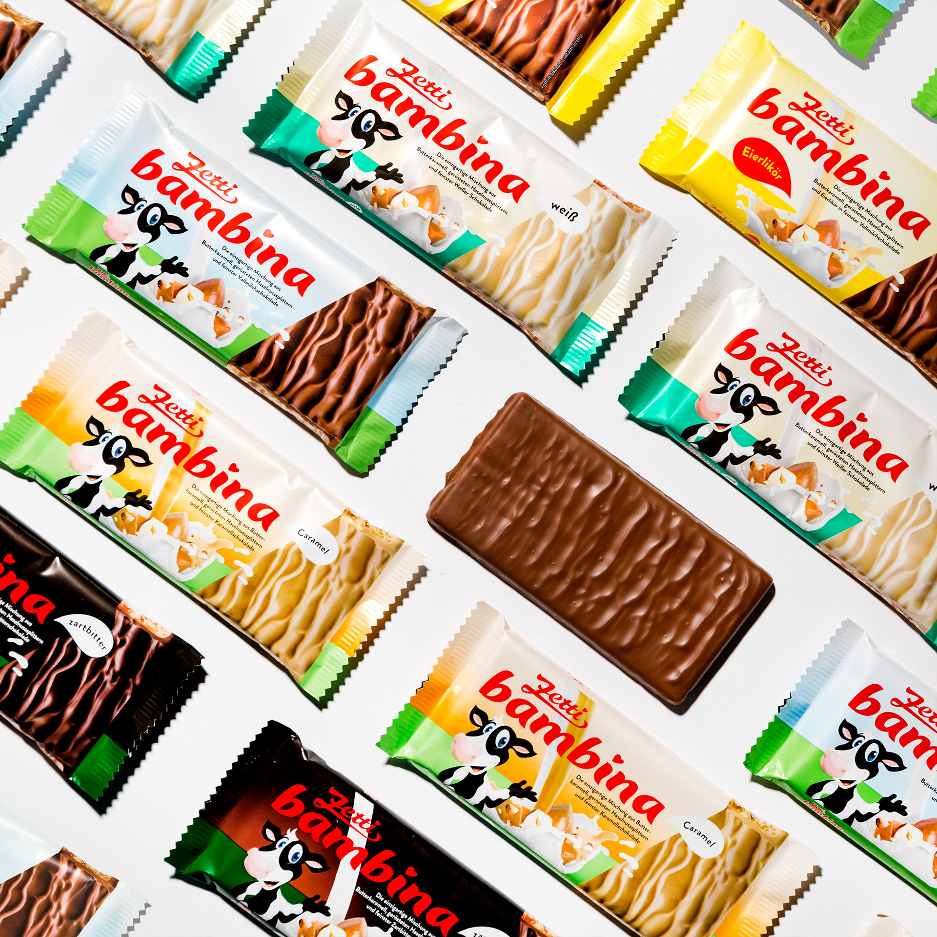 Zetti Bambina Zartbitter Eine Abbildung verschiedener aneinander gereihter Zetti Bambina Tafeln